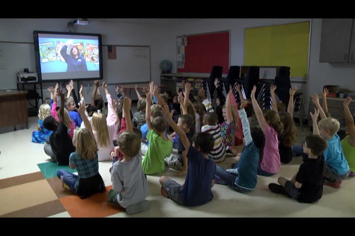 Students participating in a live virtual learning experience